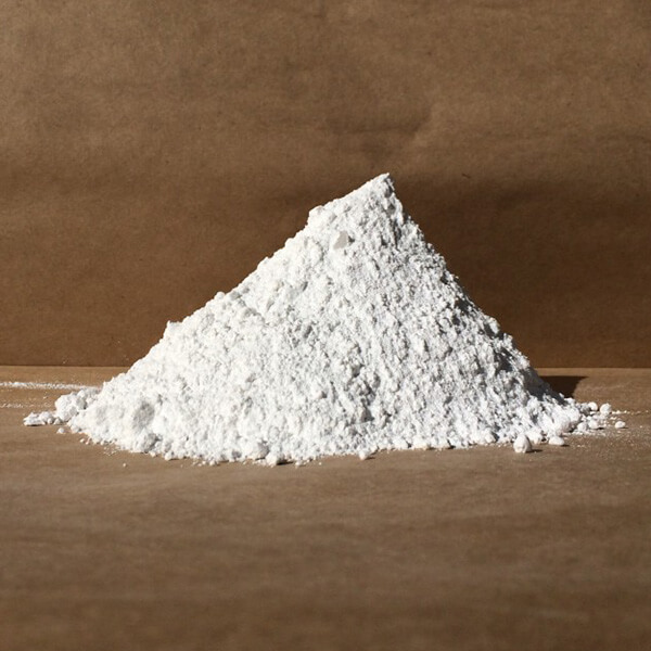 Crushed agricultural lime stockpile for soil pH correction on Alberta farms near Calgary and Edmonton