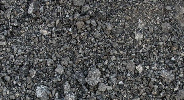Pile of asphalt millings for driveway and road resurfacing in Calgary–Edmonton, Alberta