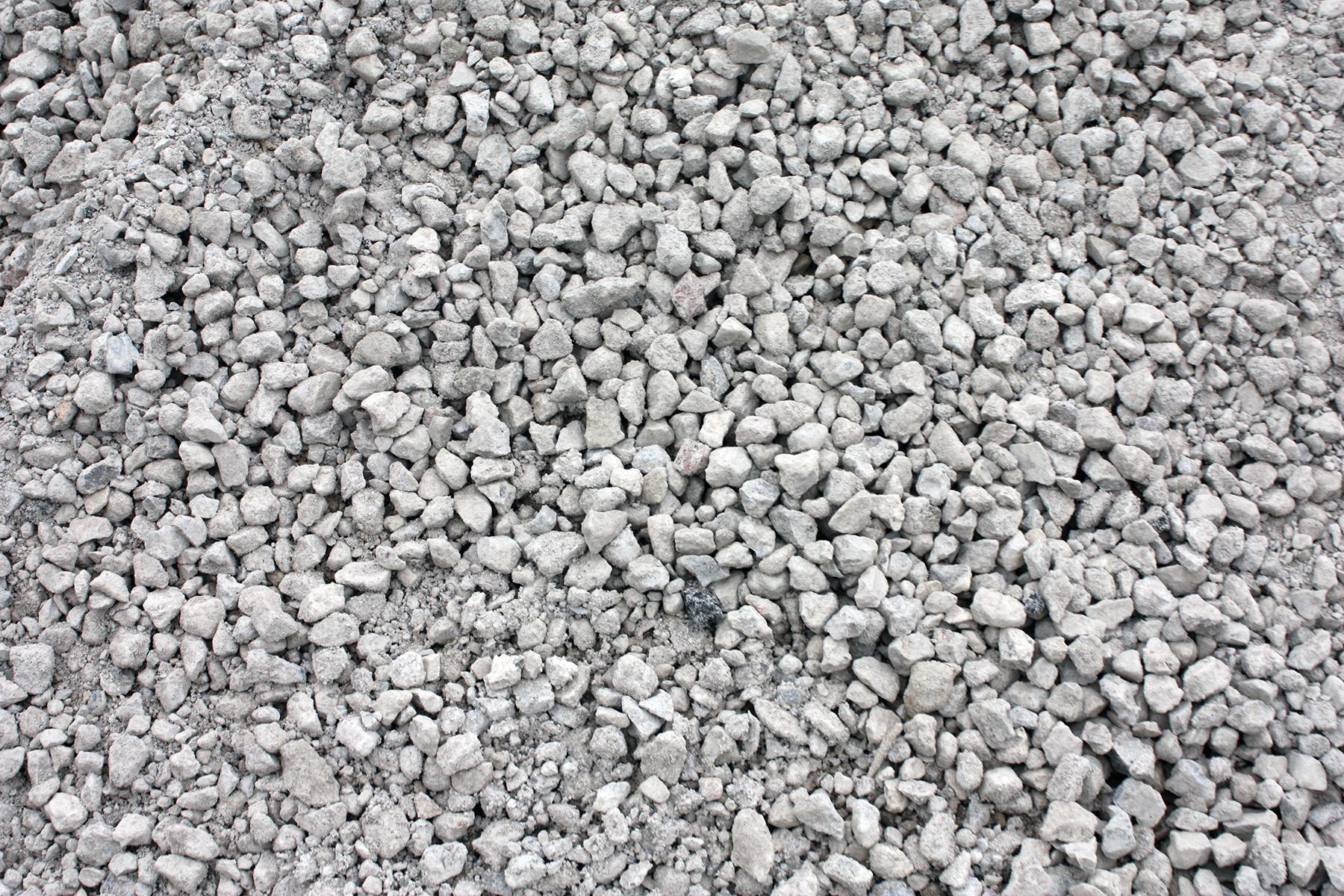 Pile of crushed recycled concrete aggregate for road base and fill in Calgary and Edmonton, Alberta
