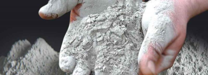 Lime kiln dust stockpile—fine powder for soil stabilization and asphalt filler in Calgary–Edmonton, Alberta