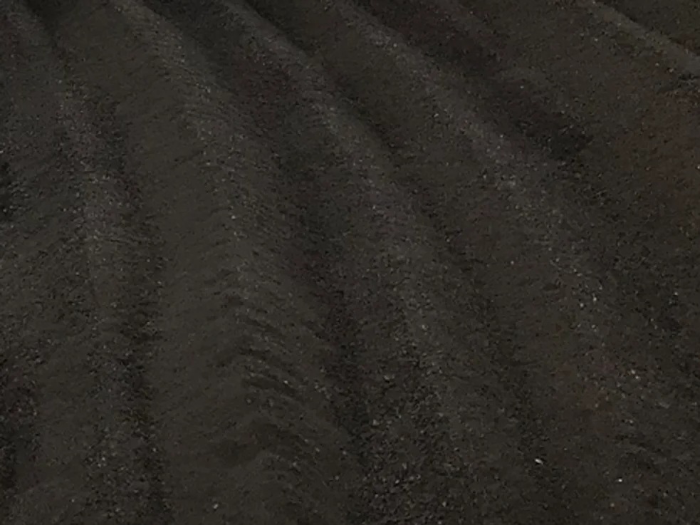 Stockpile of recycled asphalt millings ready for driveway and road resurfacing in Calgary–Edmonton, Alberta