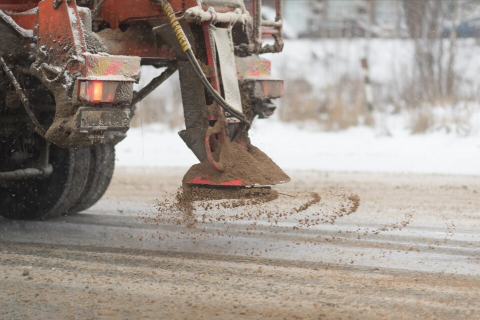 Winter highway sand stockpile for icy road traction in Calgary–Edmonton, Alberta