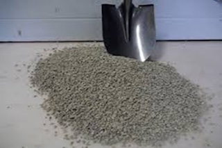 Angular winter road chips (≈ 10 mm) stockpiled for icy highway traction in Calgary–Edmonton, Alberta
